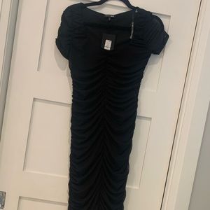 Black fashion nova dress, never worn with tags